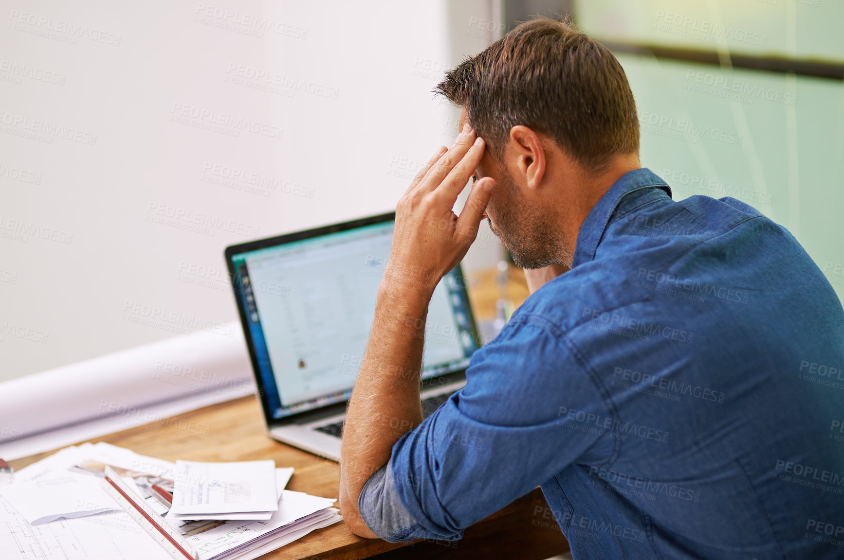 Buy stock photo Stress, finance documents and man on laptop in home for budget, financial review and mortgage payment. Thinking, computer and frustrated with paperwork for insurance, investment and bills headache