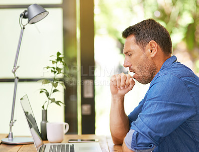 Buy stock photo Shot of a man yawning while working from home