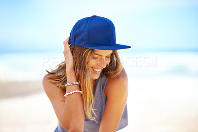 Buy stock photo Shot of an attractive young woman at the beach