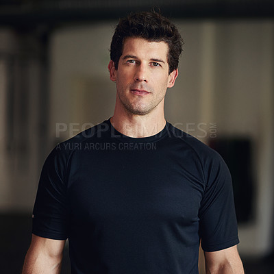 Buy stock photo Portrait of a fit man standing in a gym