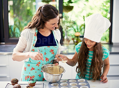Buy stock photo Cropped shot of a young child cooking in the kitchen