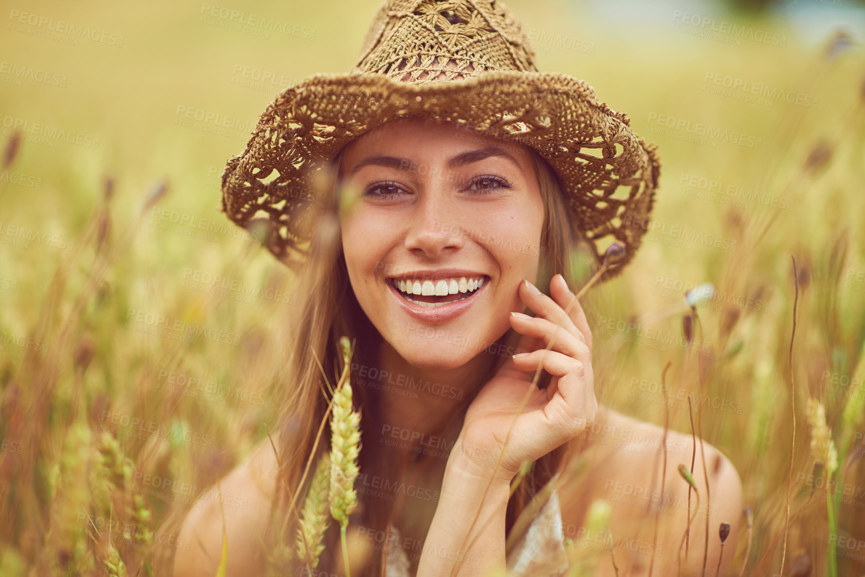 Buy stock photo Portrait, wheat field and woman with smile, nature and travel with adventure, countryside and summer holiday. Face, person and girl with hat, outdoor and calm with happiness, wellness and environment