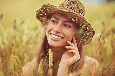 Buy stock photo Relax, smile and thinking with woman in wheat field outdoor for holiday, travel or vacation in summer. Face, future and hat with happy person in countryside or nature for calm or peaceful break