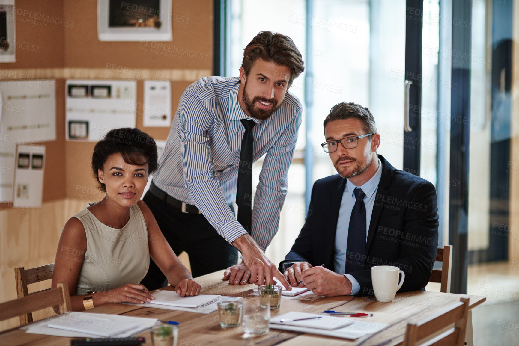 Buy stock photo Portrait of a group of colleagues working together in an office