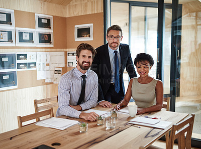 Buy stock photo Portrait of a group of colleagues working together in an office