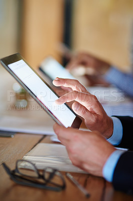 Buy stock photo Closeup shot of businesspeople using digital tablets during a conference