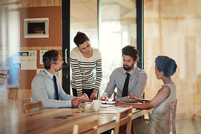Buy stock photo Shot of office workers in a meeting in a boardroom