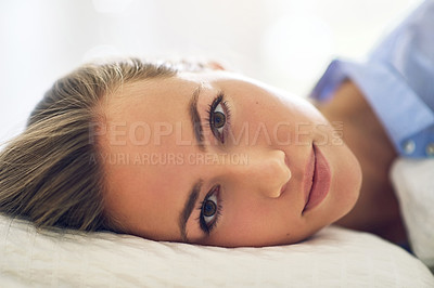 Buy stock photo Portrait of an attractive young woman relaxing in her bedroom in the morning