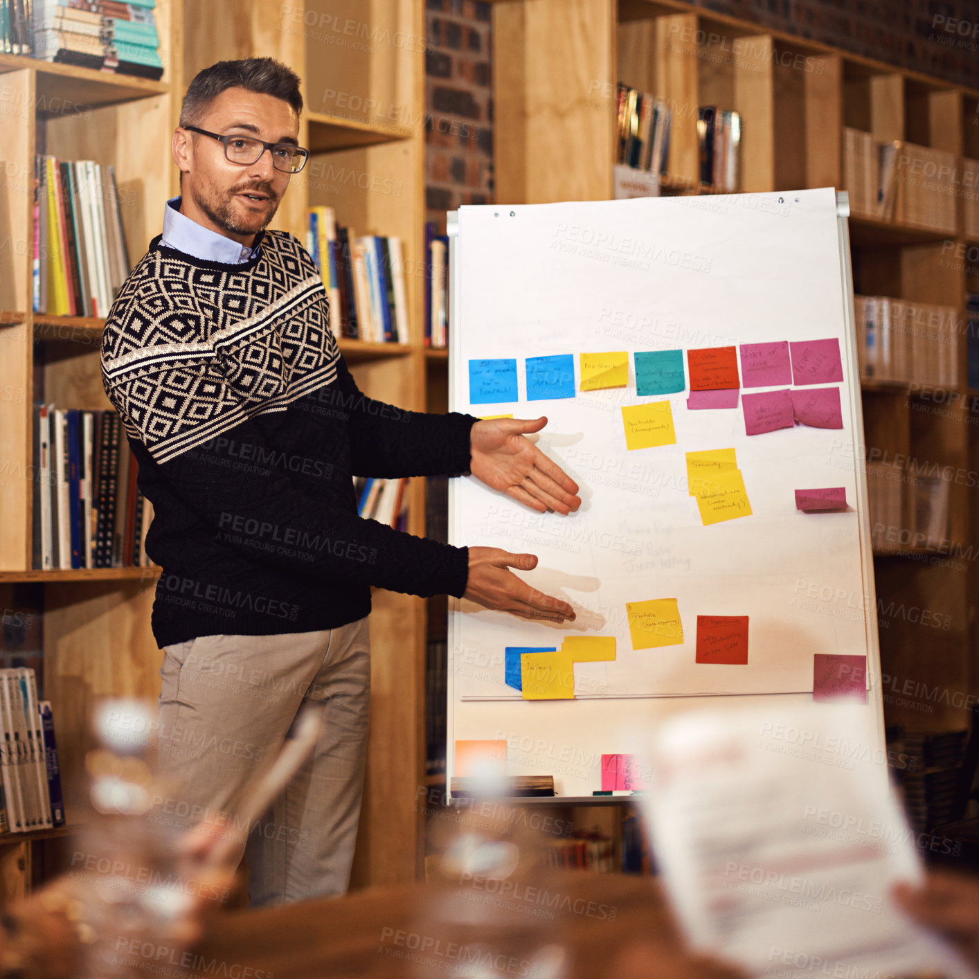 Buy stock photo Cropped shot of a businessman giving a presentation in the boardroom