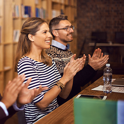 Buy stock photo Cropped shot of a group of businesspeople applauding a presentation in the boardroom