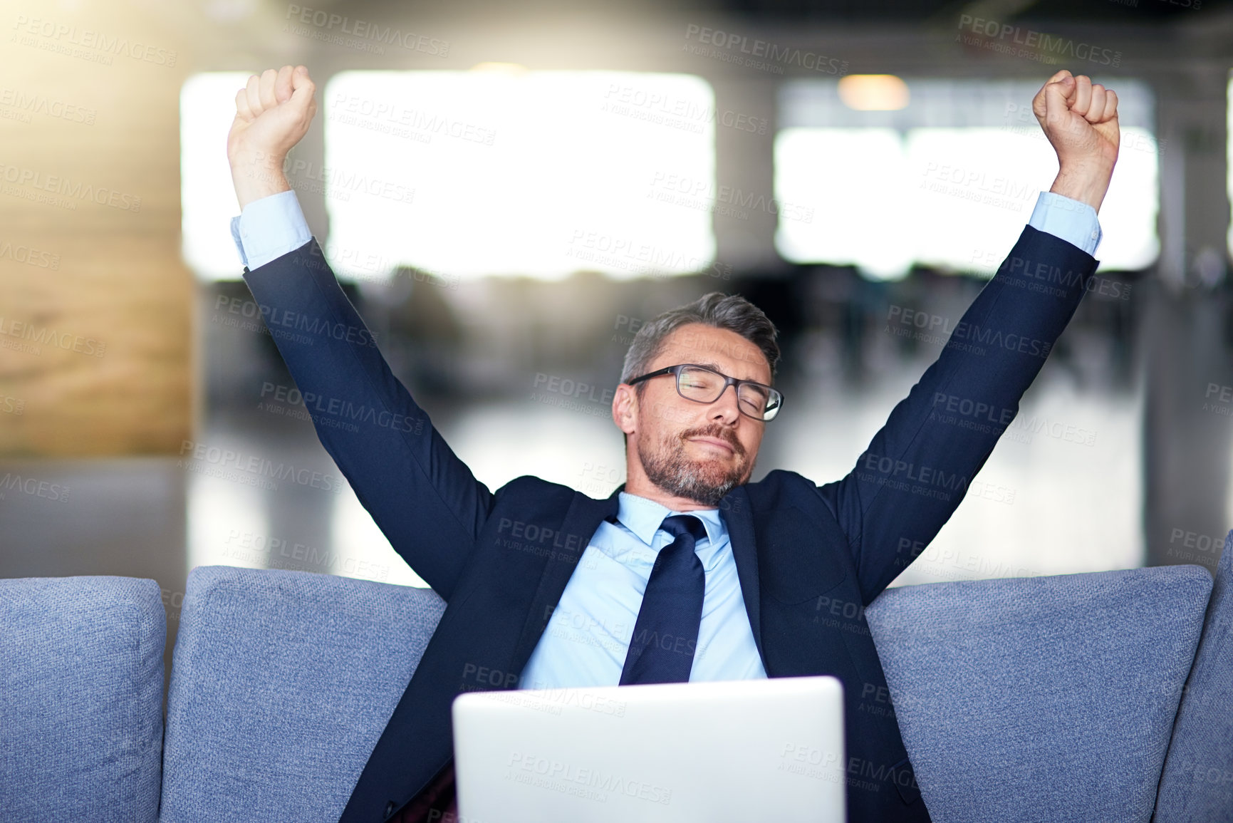 Buy stock photo Businessman, laptop and tired stretching on office sofa for project deadline or overworked, burnout or online. Male person, couch and resting break for entrepreneur fatigue or email, report or relax