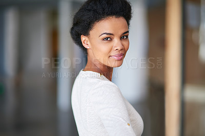 Buy stock photo Cropped portrait of a young businesswoman standing in the office