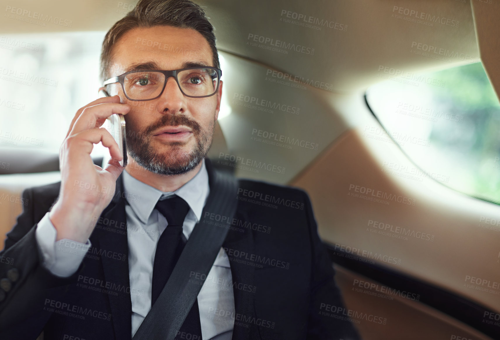 Buy stock photo Man, phone call and travel in car to listen in conversation, networking or deal for company. Person, vehicle and smartphone to thinking, transportation or commute with negotiation on business trip