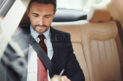 Buy stock photo Cropped shot of a businessman on his morning commute to work