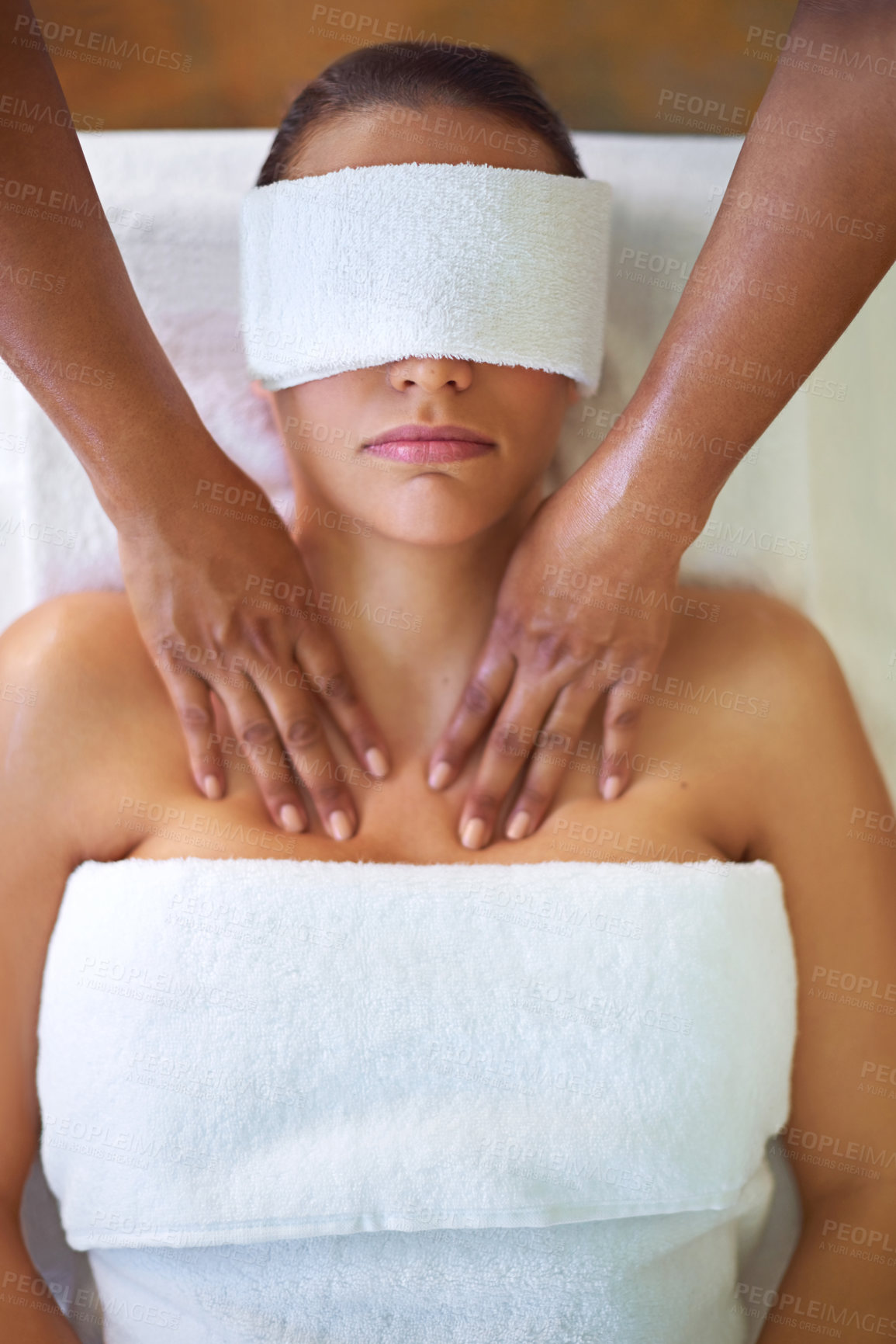Buy stock photo Woman, bed and hands for shoulders, spa and relax with treatment for wellness on vacation at luxury resort. People, masseuse and hot towel on face with muscle massage, above and healing in Thailand