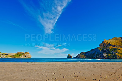 Buy stock photo Ocean, horizon and shoreline with sand, blue sky or vacation trip with rocks and environment to relax. Brazil, outdoor or view of island, sea and beach in Rio de Janeiro with destination for travel 