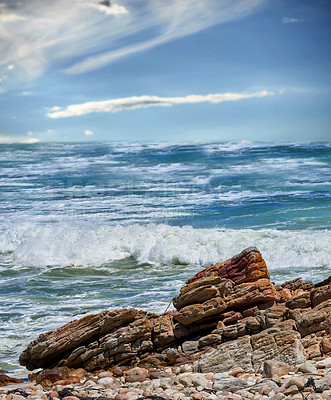 Buy stock photo Landscape, beach and travel with blue sky, rocks and clouds for tropical holiday, nature and ocean. Sea, water and waves outdoor in summer sunshine for vacation, tourism and adventure in Ibiza