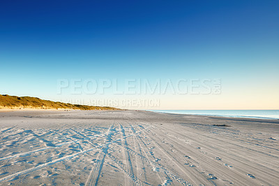 Buy stock photo Ocean, beach and landscape of coastline in nature for ecology, sustainability and growth. Habitat conservation, sea preservation and biodiversity with travel and blue sky for environment background