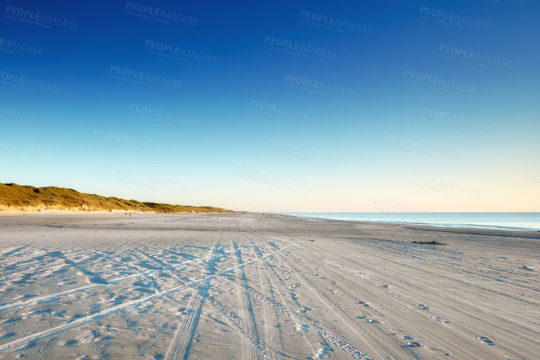 Buy stock photo Ocean, beach and landscape of coastline in nature for ecology, sustainability and growth. Habitat conservation, sea preservation and biodiversity with travel and blue sky for environment background