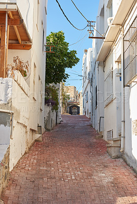 Buy stock photo City, houses and alley street outdoor for travel location, sightseeing and holiday adventure for discovery. Ancient, town and view with vintage architecture for road trip, tourism or path in Portugal