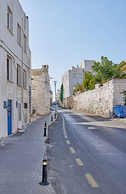 Buy stock photo Sky, asphalt and road by houses for architecture, buildings and travel or exploration in Turkey. Bodrum, street and driveway in day for heritage, history and village design in Europe for aesthetic