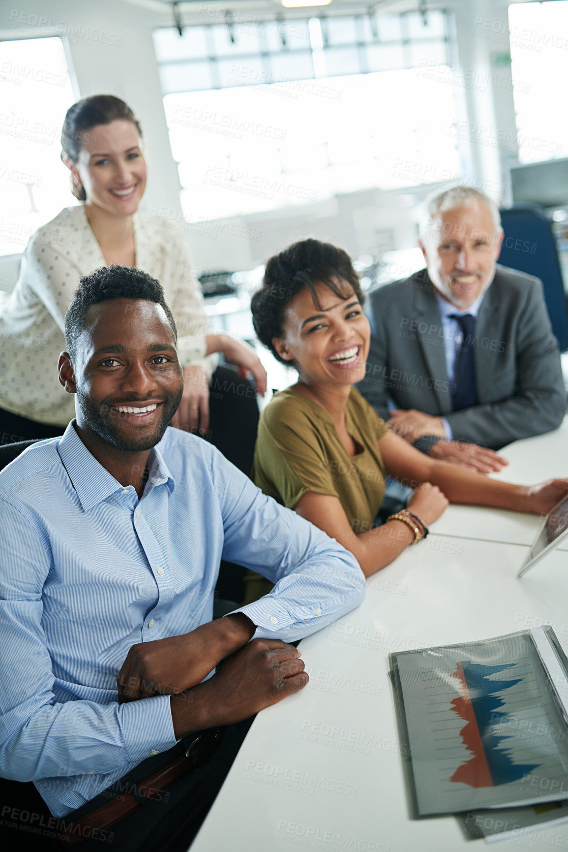 Buy stock photo Portrait of a group of coworkers sitting together in an office