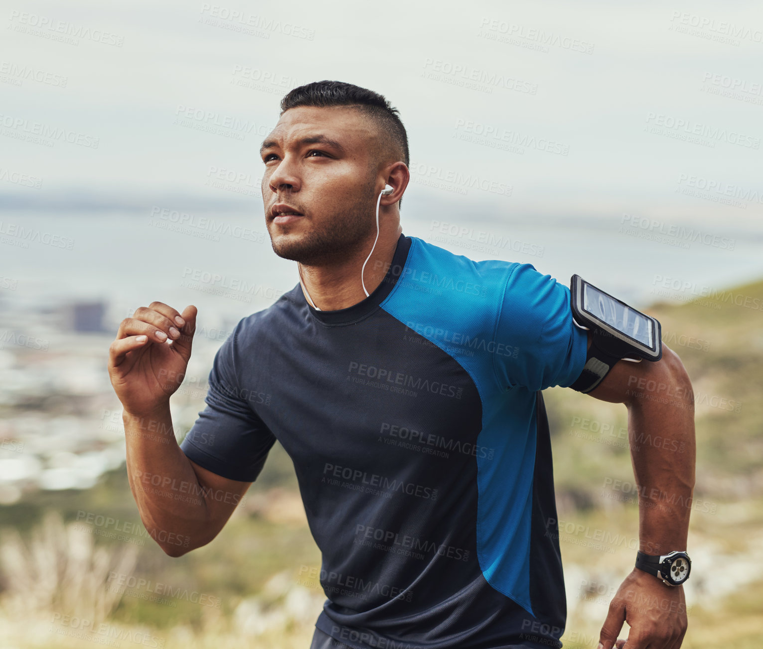 Buy stock photo Cropped shot of a young man running outdoors