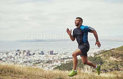 Buy stock photo Full length shot of a young man running outdoors