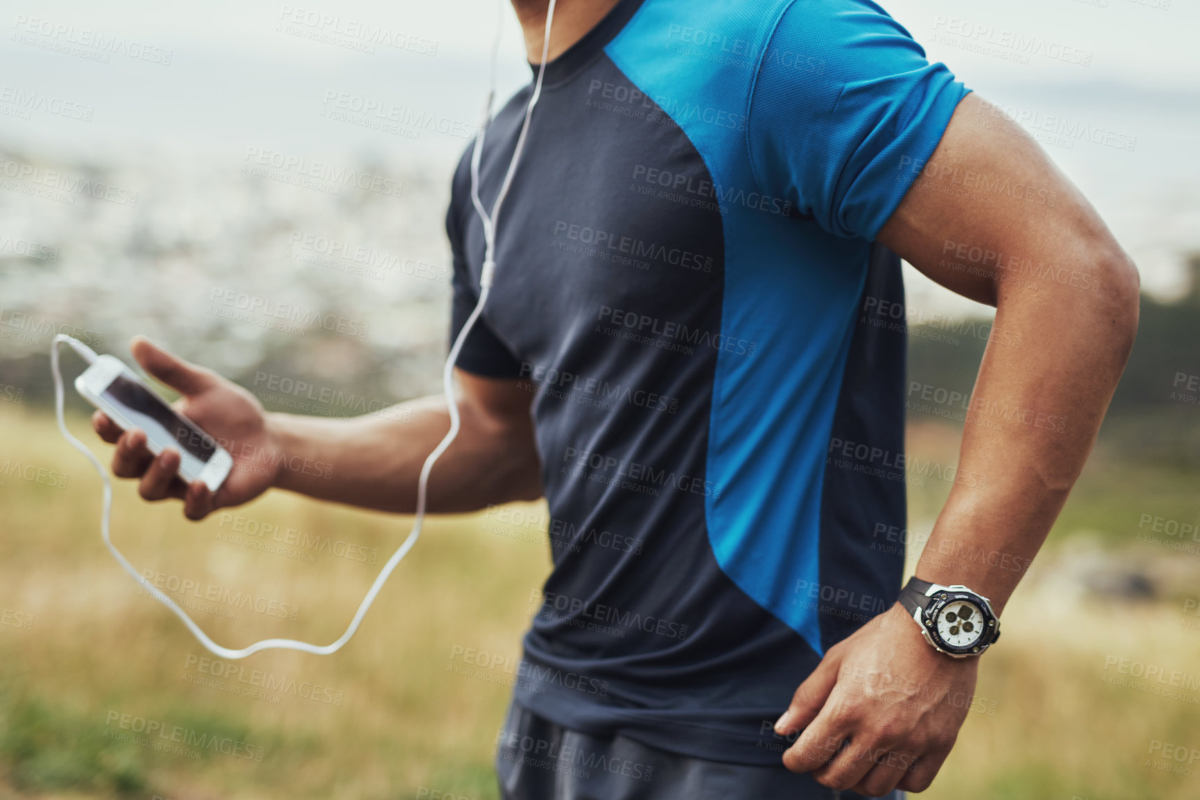 Buy stock photo Man, running and earphones outdoor for fitness, exercise, and sports training with music or energy. Athlete, wellness and cardio in morning for health, workout and performance with sound or audio