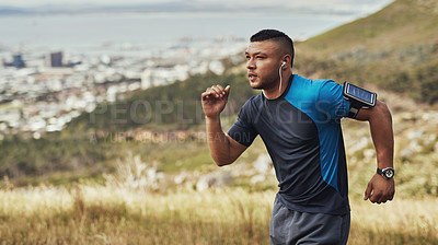 Buy stock photo Cropped shot of a young man running outdoors