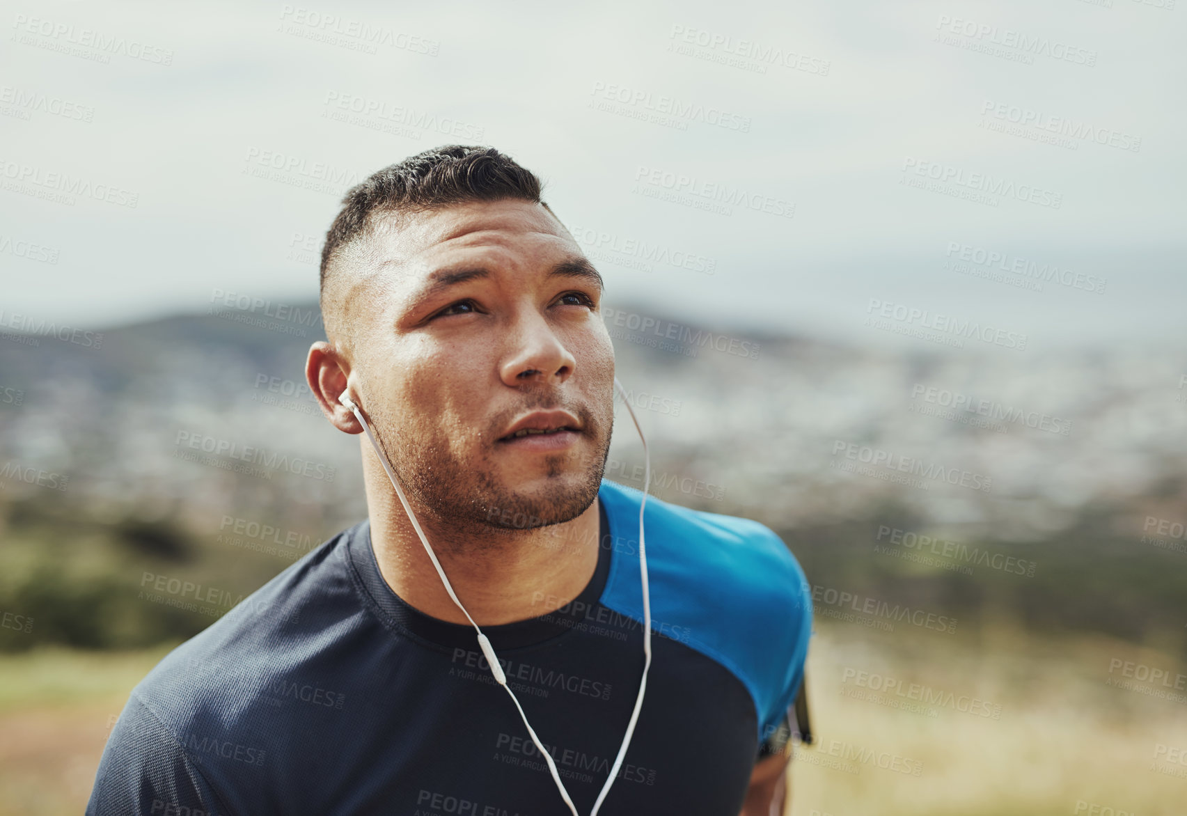 Buy stock photo Athlete, man and music with earphones, outdoor and running in morning, training and practice for competition. Healthy, runner and nature for jog, workout and exercise for marathon or cardio for sport