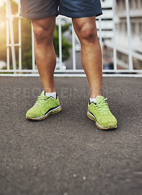 Buy stock photo Cropped shot of a male runner's legs