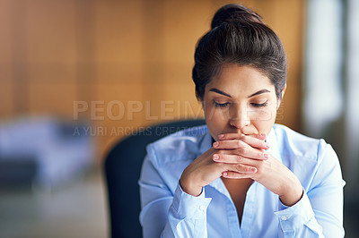 Buy stock photo Cropped shot of a young businesswoman looking stressed at the office