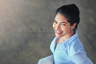 Buy stock photo High angle portrait of a young businesswoman in an office