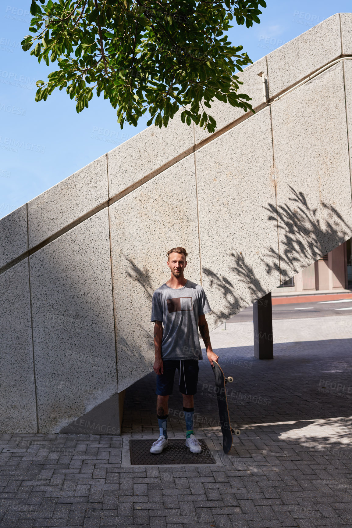 Buy stock photo Shot of skateboarders in the city