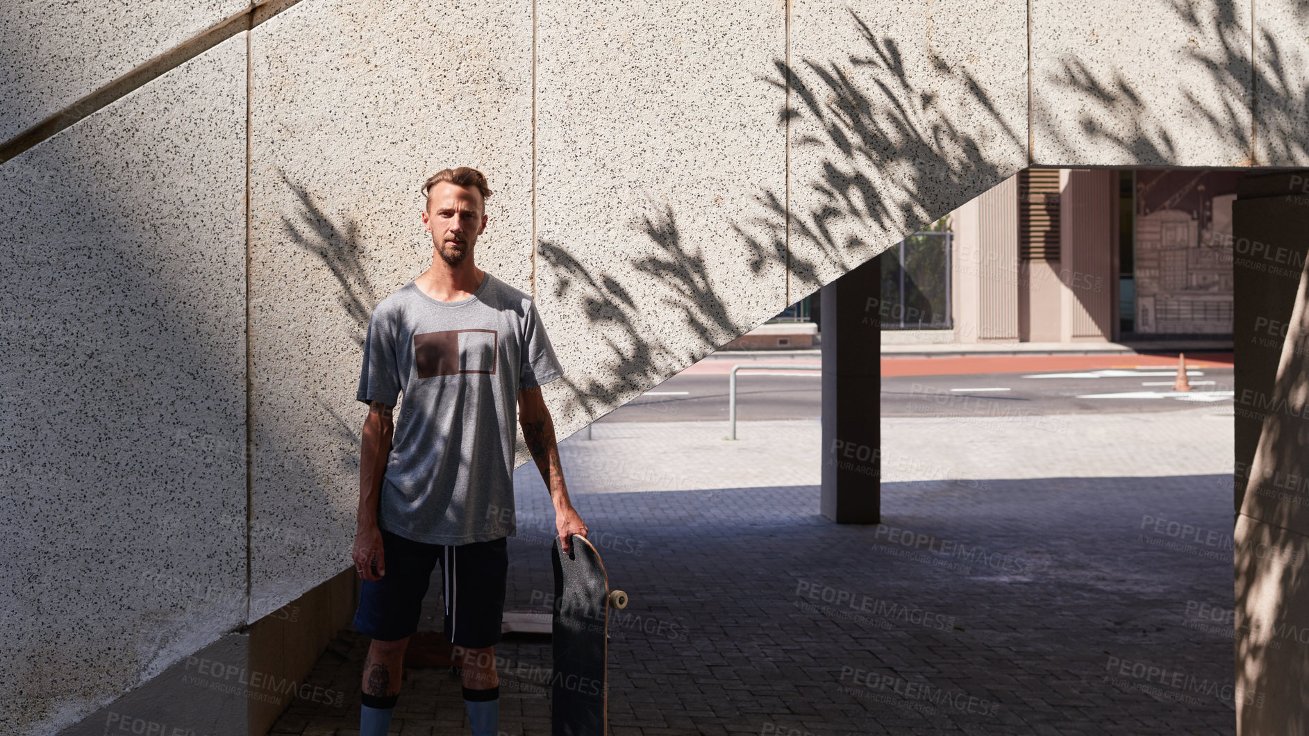 Buy stock photo Shot of skateboarders in the city