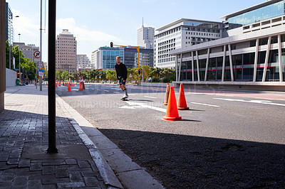 Buy stock photo City, fitness and man with skateboard, practice and skills for street skating, trick or stunt for game. Outdoor, skateboarder and person with energy for competition, speed or action for extreme sport