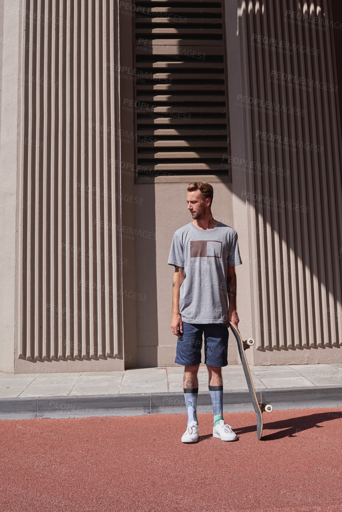 Buy stock photo Shot of skateboarders in the city