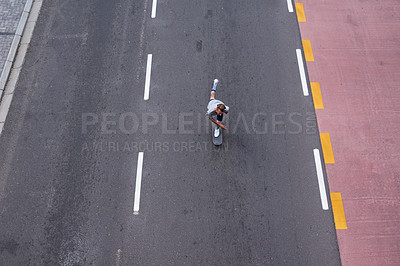 Buy stock photo City, skating and man with skateboard, speed and skills for performance, trick and stunt for game. Outdoor, skateboarder and person with energy for competition, top view or action for extreme sport