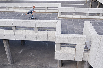 Buy stock photo Shot of skateboarders in the city