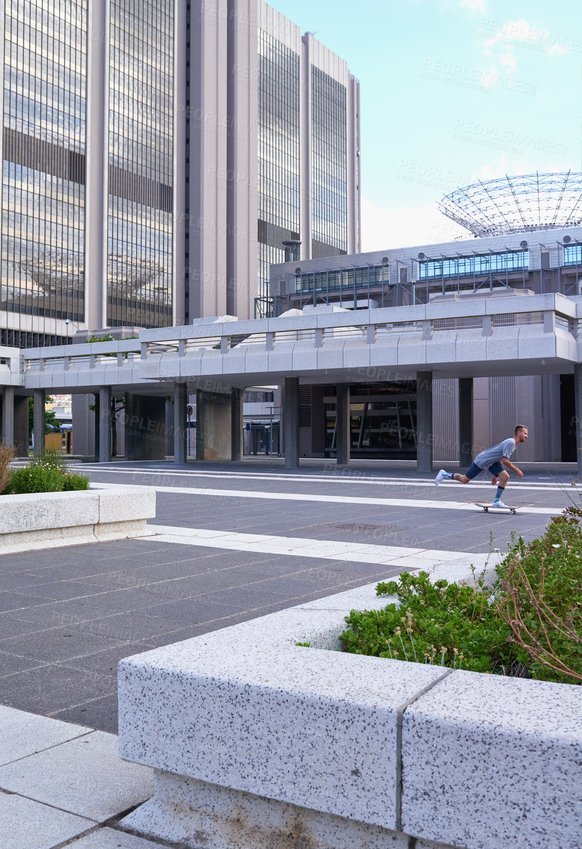 Buy stock photo Shot of skateboarders in the city