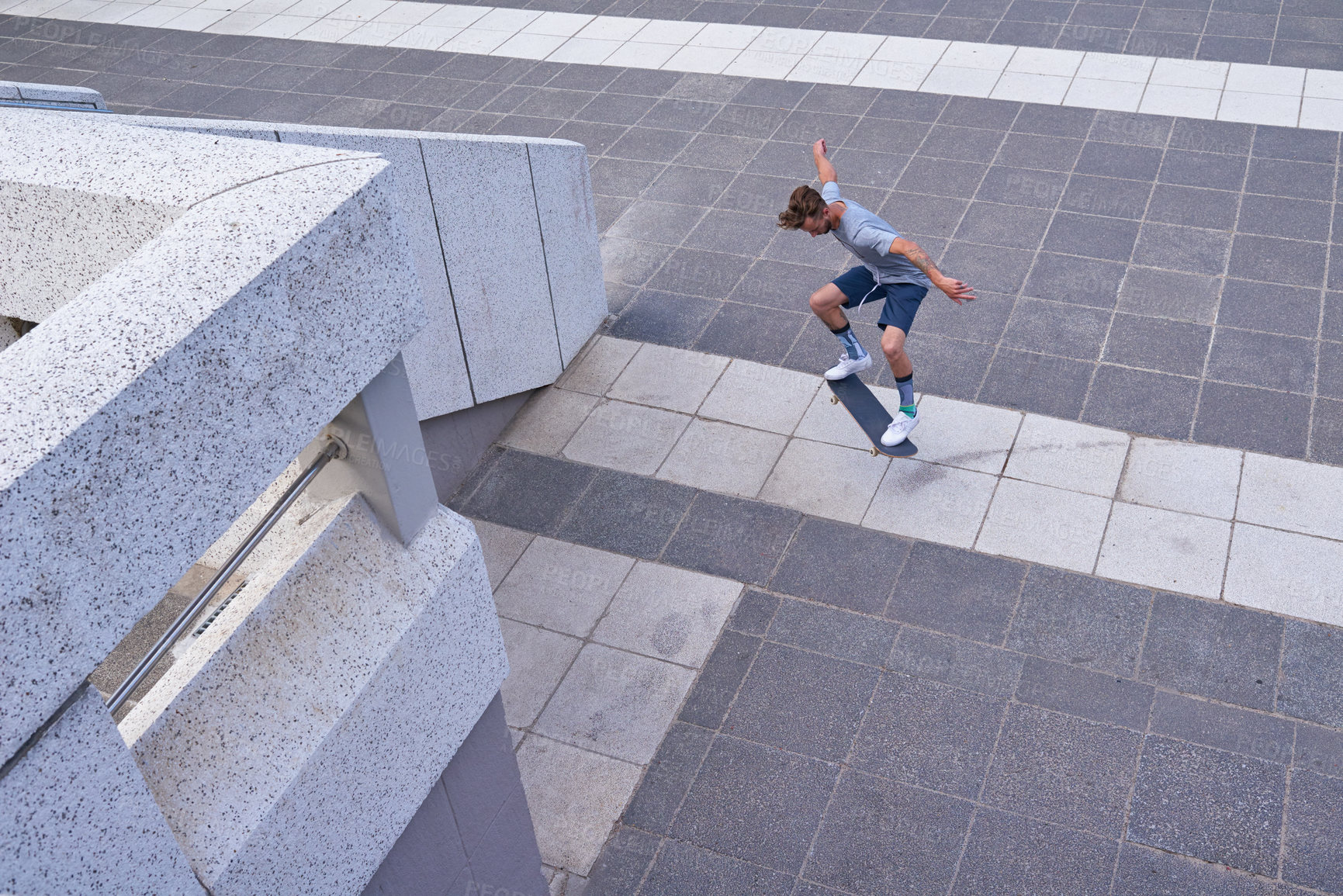 Buy stock photo Shot of skateboarders in the city