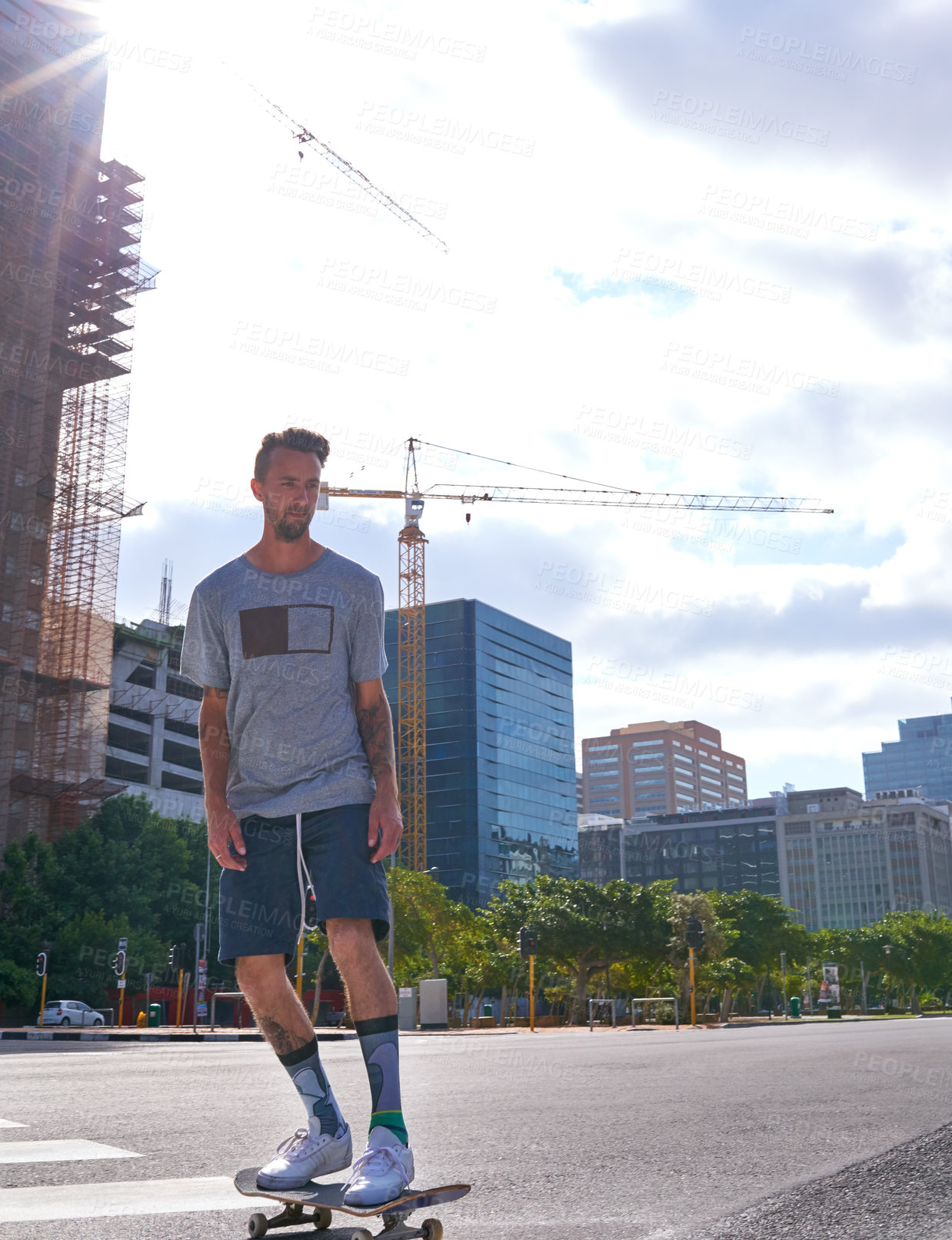 Buy stock photo Shot of skateboarders in the city