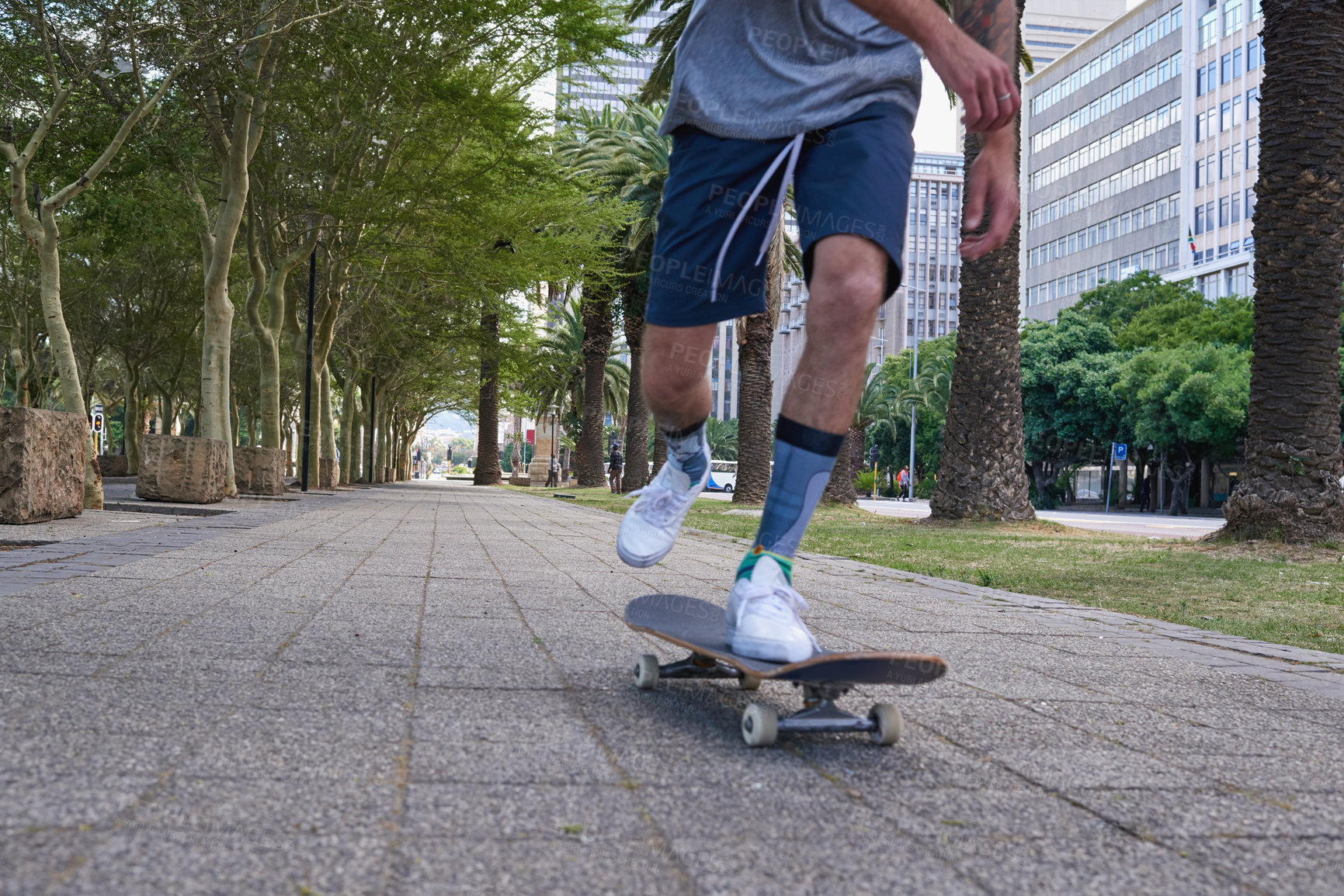 Buy stock photo Shot of skateboarders in the city