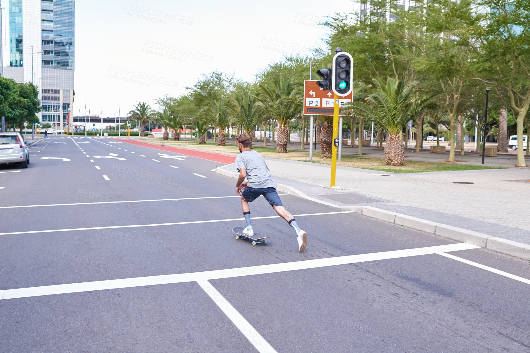 Buy stock photo Shot of skateboarders in the city