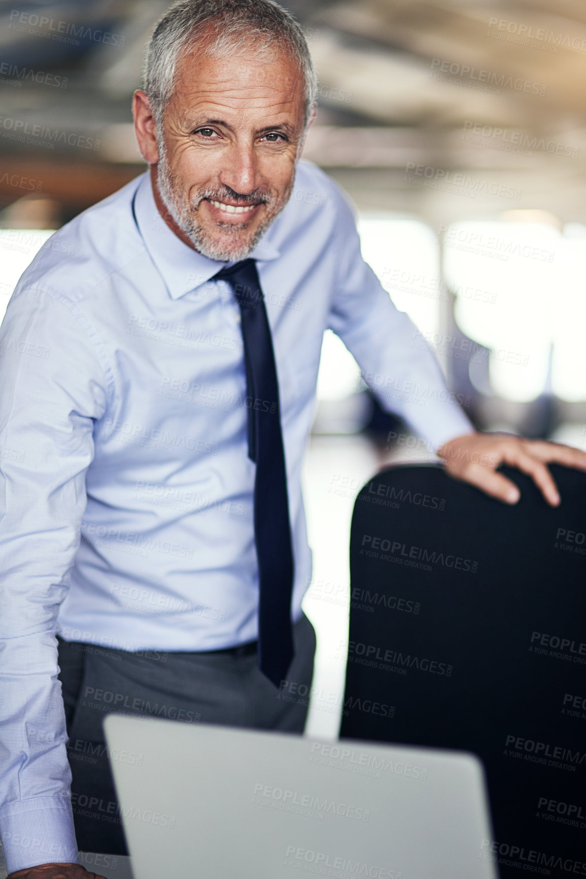 Buy stock photo CEO, portrait and happy business man in office for career, job or leadership in London. Face, smile and confident mature entrepreneur, manager or sales executive with laptop for budget report at work