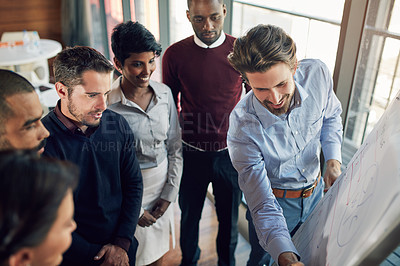 Buy stock photo Cropped shot of a young businessman giving a presentation