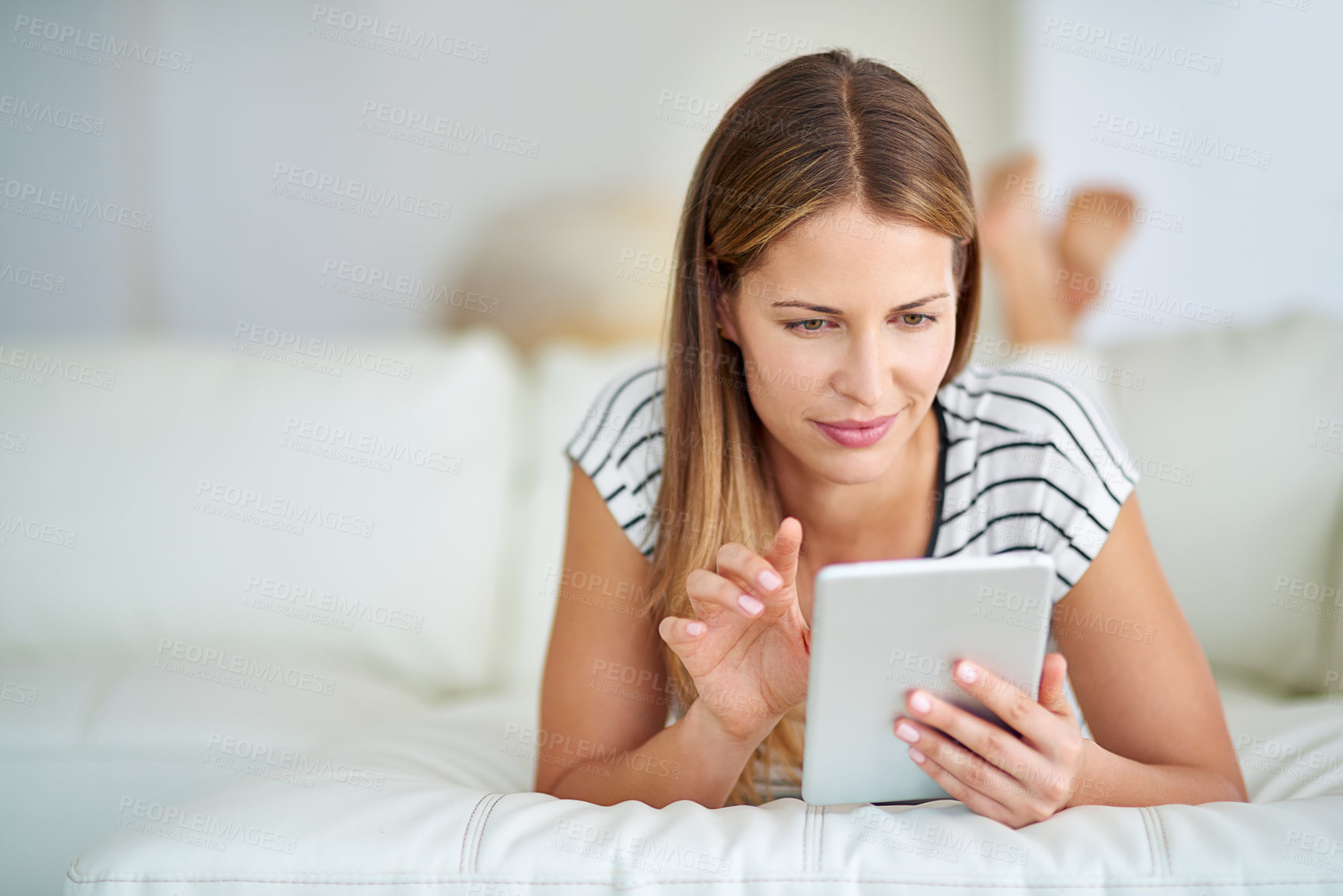 Buy stock photo Woman, sofa and tablet with video or streaming for internet research, reading news or blog for ideas. Female person, couch and ebook with website for diy plan in home, relax with scroll for info