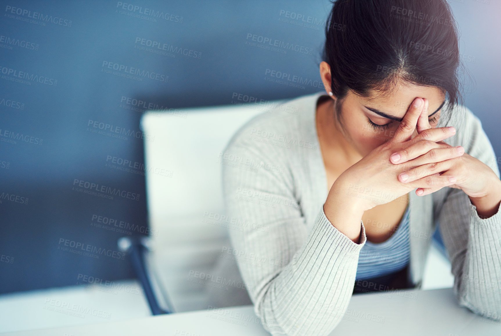 Buy stock photo Business woman, stress and tired in office with hands, worried and anxiety at desk at startup. Young businesswoman, burnout and headache with anxiety, frustrated or financial crisis in workplace