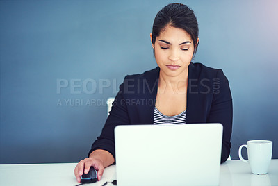 Buy stock photo Laptop, copywriter and woman in working, reading on internet at office with serious for research. Creative, person and technology in online, digital and website for deadline, due date or project
